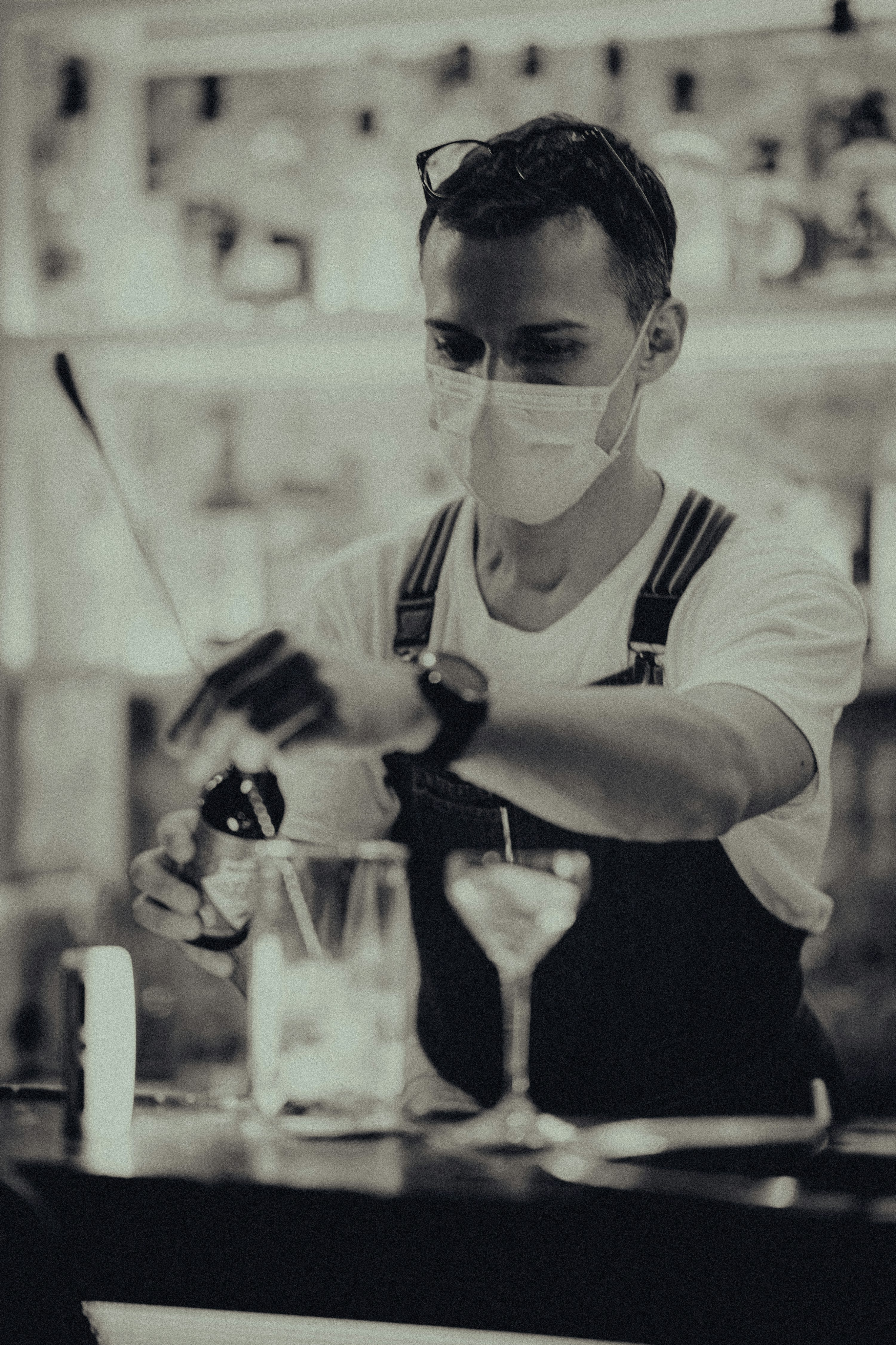 man mixing drinks